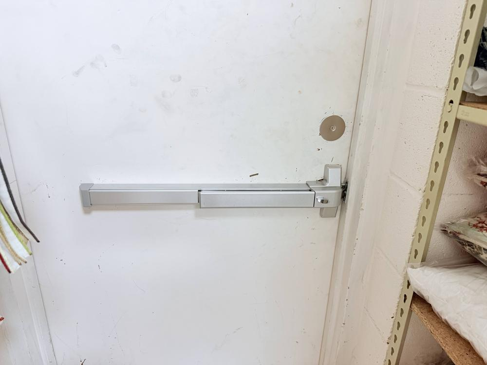 Panic exit device on a commercial door repaired in a Northern Virginia property