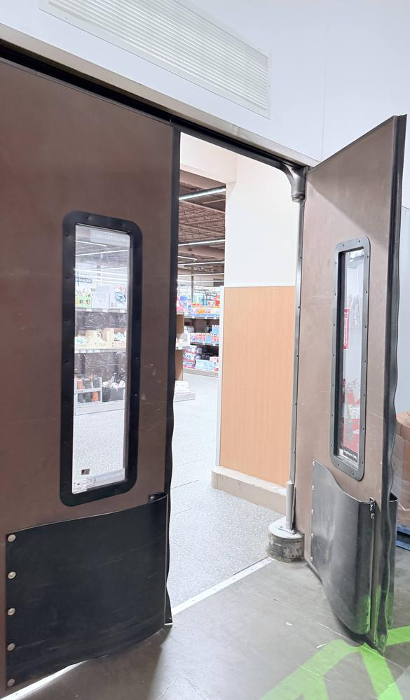 Backroom impact doors repaired in a commercial retail property