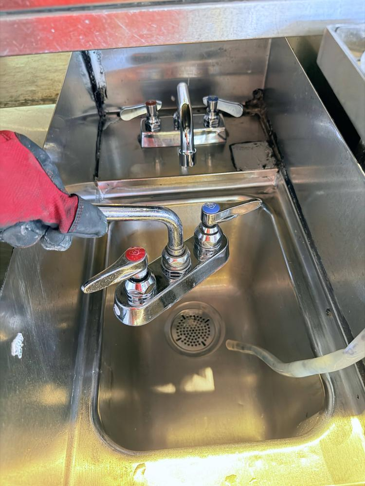 Replacing a faucet on a stainless commercial sink
