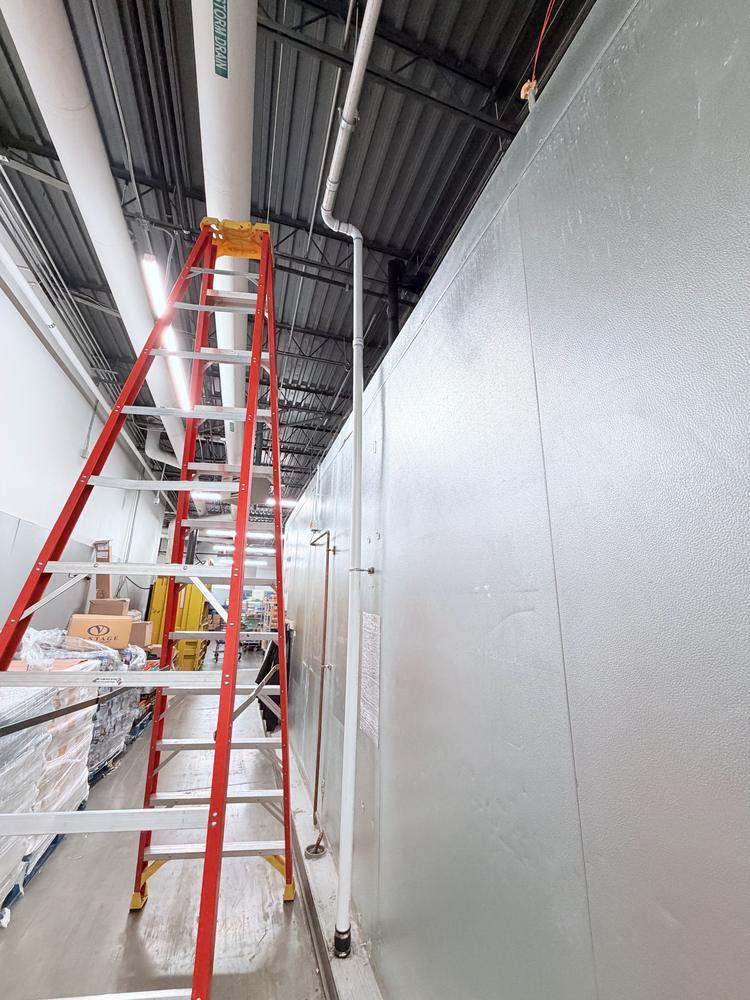 Ladder access for high-level maintenance work in a warehouse